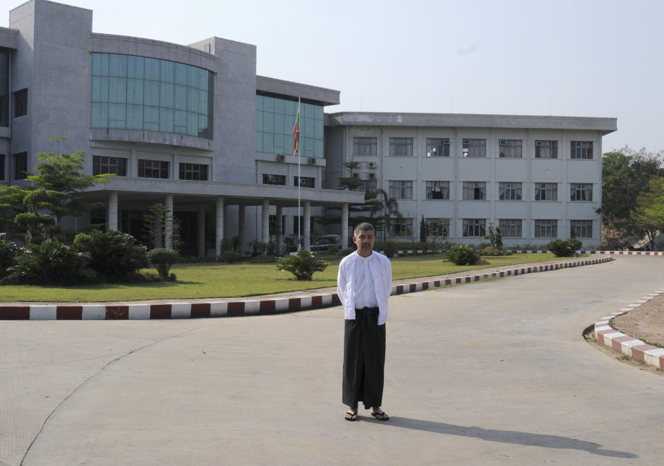 In this picture taken on Feb. 29, 2012, Aye Chan Naing, the executive director of the Norway-based Democratic Voice of Burma, which has broadcast independent news for two decades into Myanmar, one of the world's most oppressed nations, stands outside the Ministry of Information in Myanmar’s capital, Naypyitaw. Aye Chan is part of a trickle of exiles spanning the globe who have begun to see for themselves if Myanmar's campaign of reforms is real. (AP Photo/ Turid Rogne)