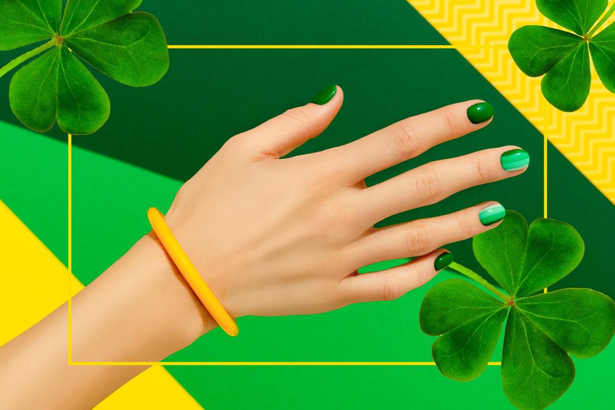 St. Patrick's Day Nails woman hand green nail design yellow green background clovers