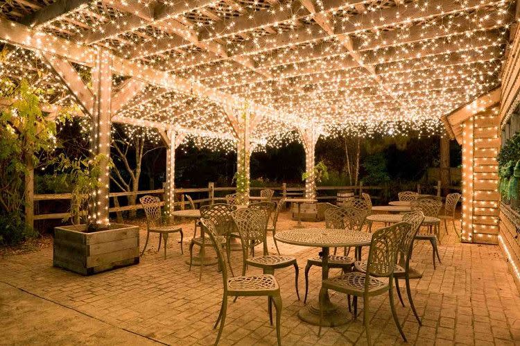 <p>If you're planning to go all out for a special summer party, opt for a more extravagant look by hanging dozens of lights on a patio or porch's ceiling.</p><p><strong>See more at <a href="http://25mainstreet.com/products/17-meter-string-of-100-led-solar-powered-fairy-lights-1" rel="nofollow noopener" target="_blank" data-ylk="slk:25 Main Street;elm:context_link;itc:0;sec:content-canvas" class="link ">25 Main Street</a>.</strong></p><p><strong><a class="link " href="https://www.amazon.com/AmazonBasics-Commercial-Outdoor-Christmas-String/dp/B07TRM8WSY/ref=sr_1_3?tag=syn-yahoo-20&ascsubtag=%5Bartid%7C10050.g.3404%5Bsrc%7Cyahoo-us" rel="nofollow noopener" target="_blank" data-ylk="slk:Shop Christmas lights;elm:context_link;itc:0;sec:content-canvas">Shop Christmas lights</a><br></strong></p>
