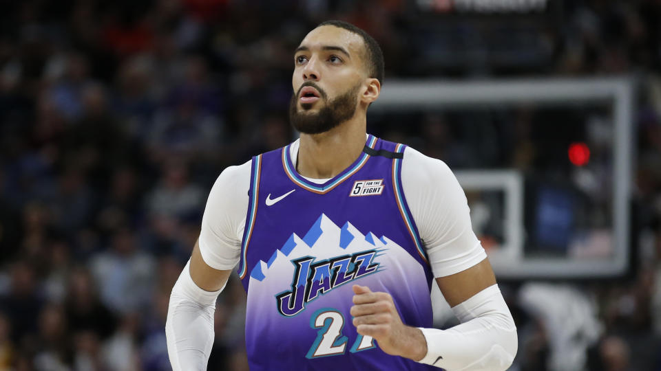 Utah Jazz center Rudy Gobert (27) runs up court in the second half during an NBA basketball game against the Houston Rockets Monday, Jan. 27, 2020, in Salt Lake City. (AP Photo/Rick Bowmer)