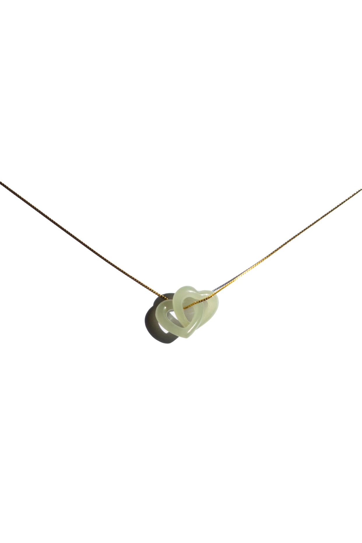<p><a href="https://www.seree.co/collections/new-in/products/the-hearts-interlocking-jade-pendant-necklace" rel="nofollow noopener" target="_blank" data-ylk="slk:Shop Now;elm:context_link;itc:0;sec:content-canvas" class="link rapid-noclick-resp">Shop Now</a></p><p>The Hearts Interlocking Jade Pendant Necklace</p><p>$128.00</p><p>seree.co</p><span class="copyright">Seree</span>