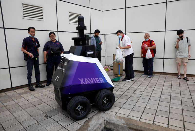 Autonomous robot Xavier patrols a neighbourhood mall to detect "undesirable social behaviours" during a three-week trial in Singapore