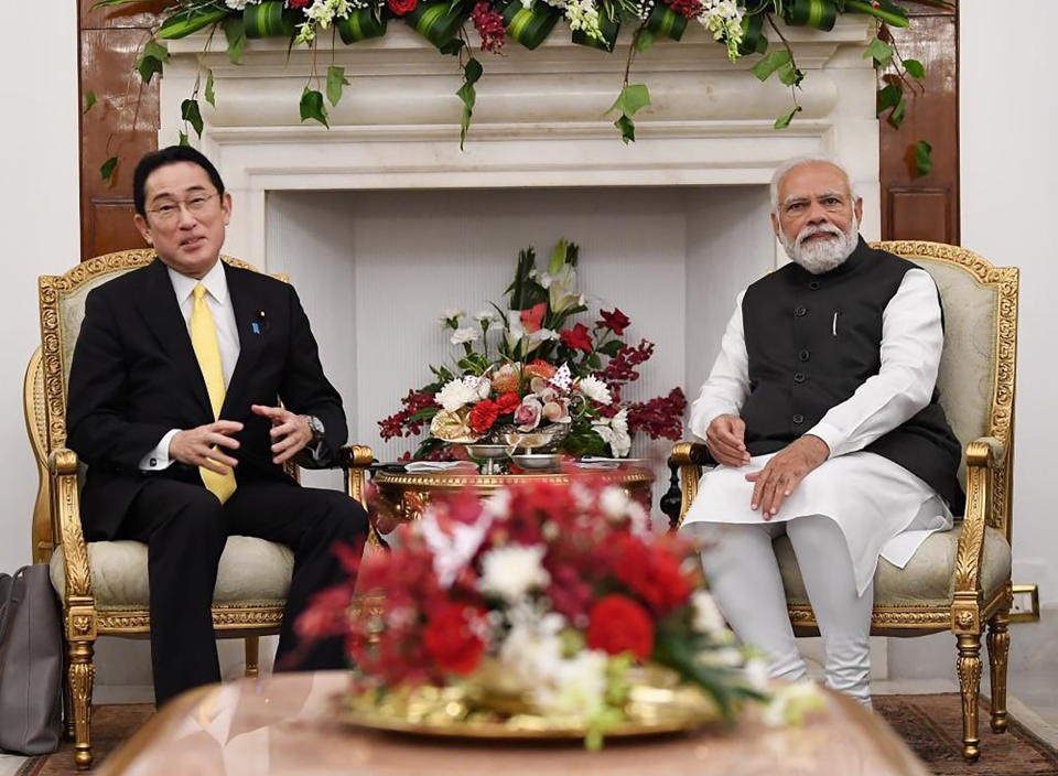 This handout photograph released by India's Ministry of External Affairs shows Indian Prime Minister Narendra Modi and his Japanese counterpart Fumio Kishida in New Delhi, Saturday, March 19, 2022. India says ties with Japan are key to stability in the Indo-Pacific region. The two nations, along with the United States and Australia, are members of the Indo-Pacific alliance known as “the Quad” that is grappling with a rising China’s coercive economic practices and military maneuvering. (Ministry of External Affairs via AP)