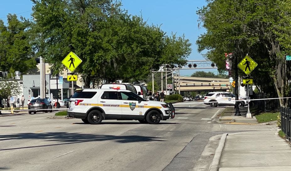 Jacksonville police cordone off the scene on Atlantic Boulevard in San Marco after an officer shot a man who was wielding a large knife March 30, 2024, according to the Sheriff's Office. He is expected to recover.