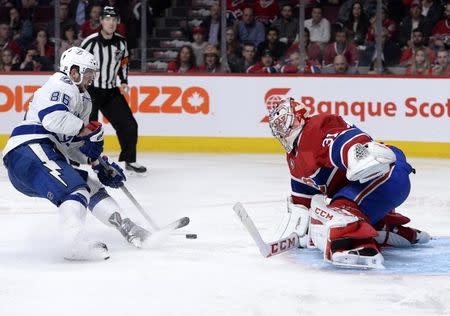 May 1, 2015; Montreal, Quebec, CAN; Montreal Canadiens goalie Carey Price (31) makes a save against Tampa Bay Lightning forward Nikita Kucherov (86) during the overtime period in game two of the second round of the 2015 Stanley Cup Playoffs at the Bell Centre. Mandatory Credit: Eric Bolte-USA TODAY Sports