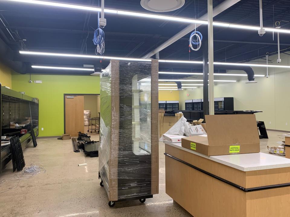 Equipment is being moved into Sommers Discount Market's new location at the Southeast Market Plaza at 1318 Gonder Ave. SE in Canton. The store is expected to open next month.
