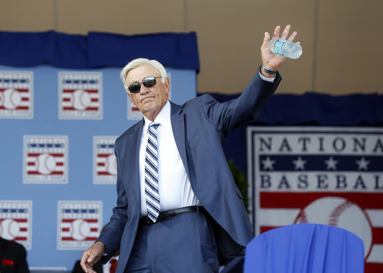 National Baseball Hall of Famer Phil Niekro arrives for an induction ceremony at the Clark Sports Center on Sunday, July 26, 2015, in Cooperstown, N.Y. (AP Photo/Mike Groll)