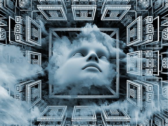 A human face in the middle of a box with clouds around it.