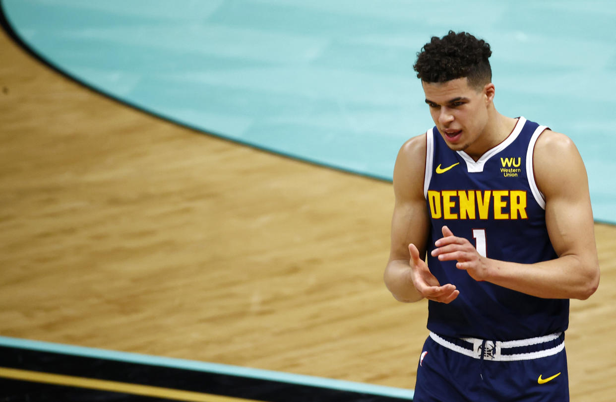 CHARLOTTE, NORTH CAROLINA - MAY 11: Michael Porter Jr. #1 of the Denver Nuggets reacts following a timeout call during the fourth quarter of their game against the Charlotte Hornets at Spectrum Center on May 11, 2021 in Charlotte, North Carolina. NOTE TO USER: User expressly acknowledges and agrees that, by downloading and or using this photograph, User is consenting to the terms and conditions of the Getty Images License Agreement. (Photo by Jared C. Tilton/Getty Images)