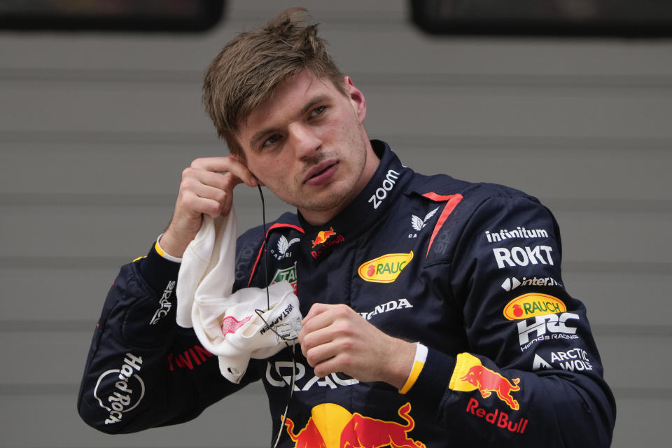 Red Bull driver Max Verstappen of the Netherlands reacts after taking pole position following qualifying at the Chinese Formula One Grand Prix at the Shanghai International Circuit, Shanghai, China, Saturday, April 20, 2024. (AP Photo/Andy Wong)