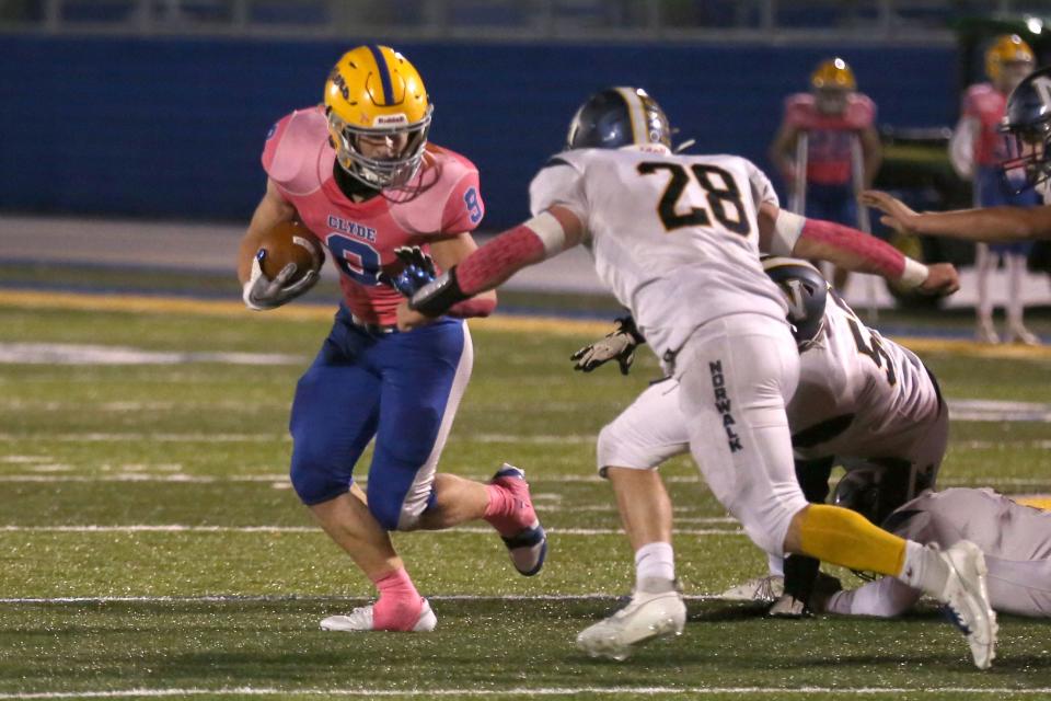 Clyde's Clark Norman carries the ball.