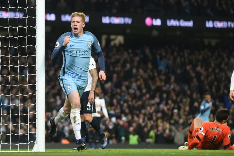 Tottenham Hotspur's goalkeeper Hugo Lloris (R) reacts as Manchester City's Belgian midfielder Kevin De Bruyne celebrates scoring on January 21, 2017