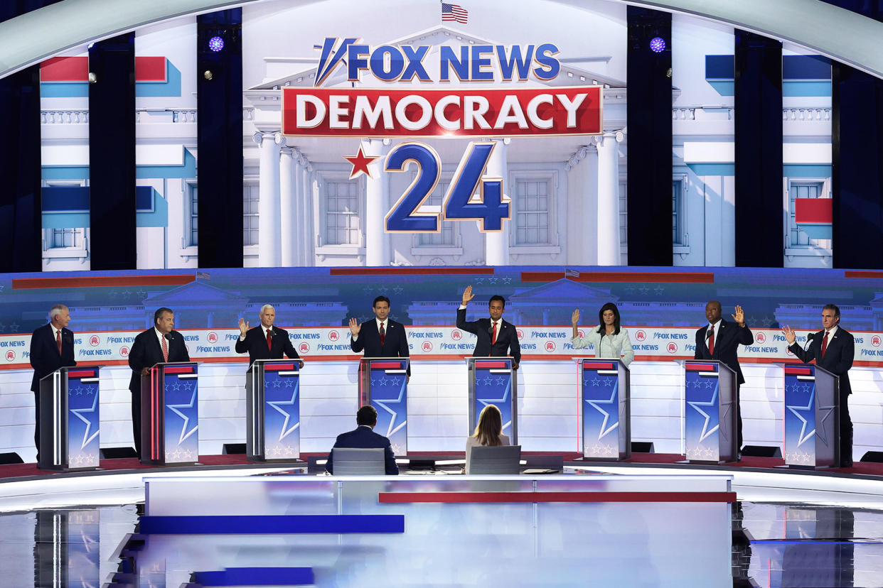 hands raised first Republican GOP presidential debate 2024 Win McNamee/Getty Images