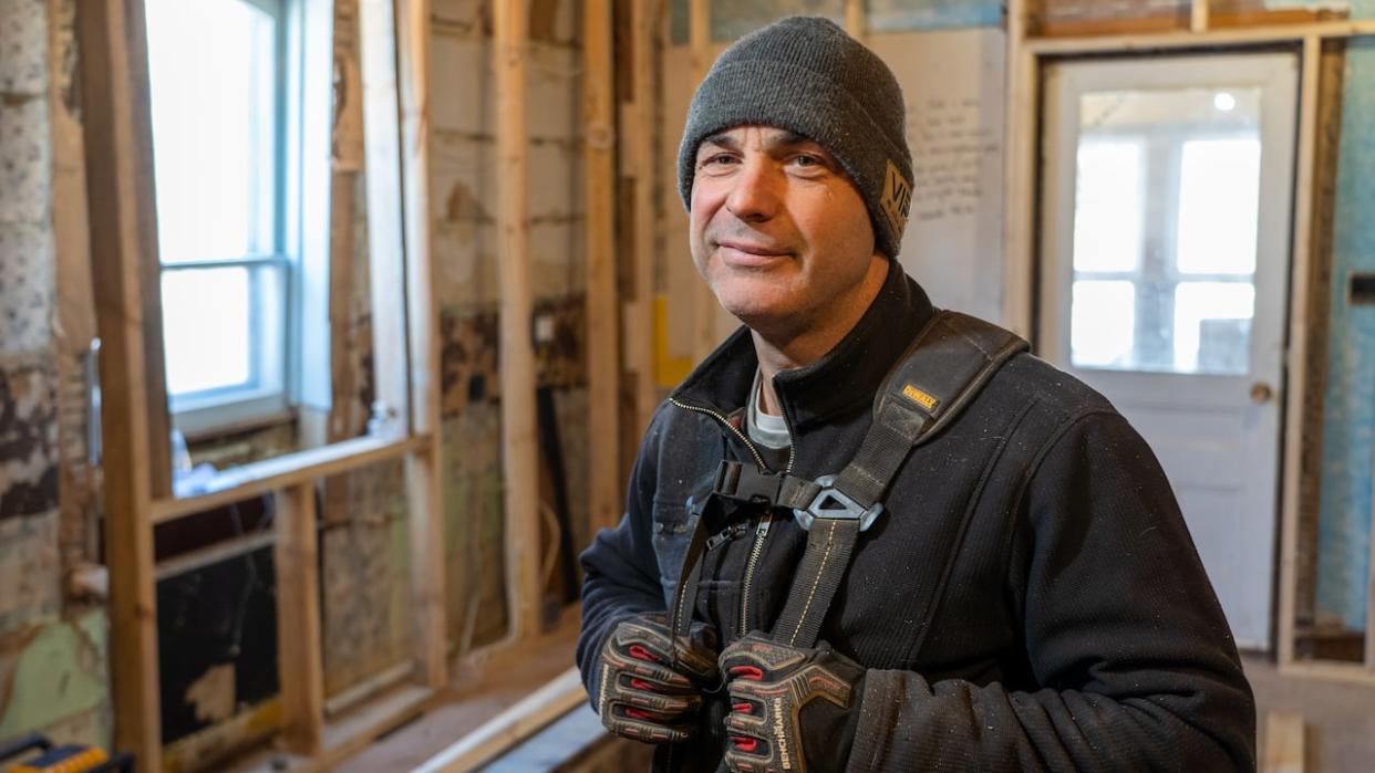 Spencer Kell stands in a room that will soon become the kitchen of the rehab centre he plans to open for people in remand who want treatment for their addictions.   (Francis Ferland/CBC - image credit)