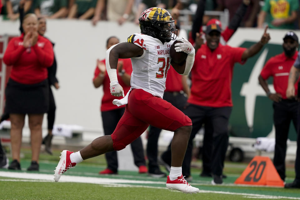 Maryland running back Antwain Littleton II runs for a touchdown against Charlotte during the first half of an NCAA college football game on Saturday, Sept. 10, 2022, in Charlotte, N.C. (AP Photo/Chris Carlson)