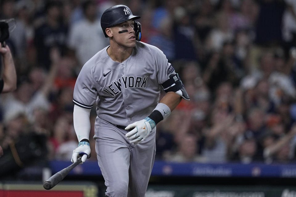 New York Yankees' Aaron Judge watches his home run against the Houston Astros during the third inning of a baseball game Saturday, Sept. 2, 2023, in Houston. (AP Photo/Kevin M. Cox)