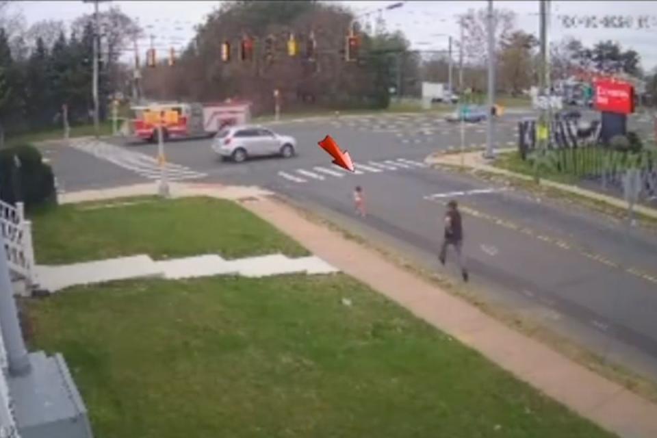 <p> Osvaldo Lugo/Instagram</p> Camera footage showed the moment a barber was running after and then rescuing a child who was heading towards oncoming traffic in East Hartford, Conn., on April 25, 2024