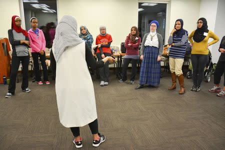Egyptian-American community activist Rana Abdelhamid teaches during a self-defense workshop designed for Muslim women in Washington, DC, March 4, 2016 in this handout photo provided by Rawan Elbaba. Picture taken March 4, 2016. REUTERS/Rawan Elbaba/Handout via Reuters