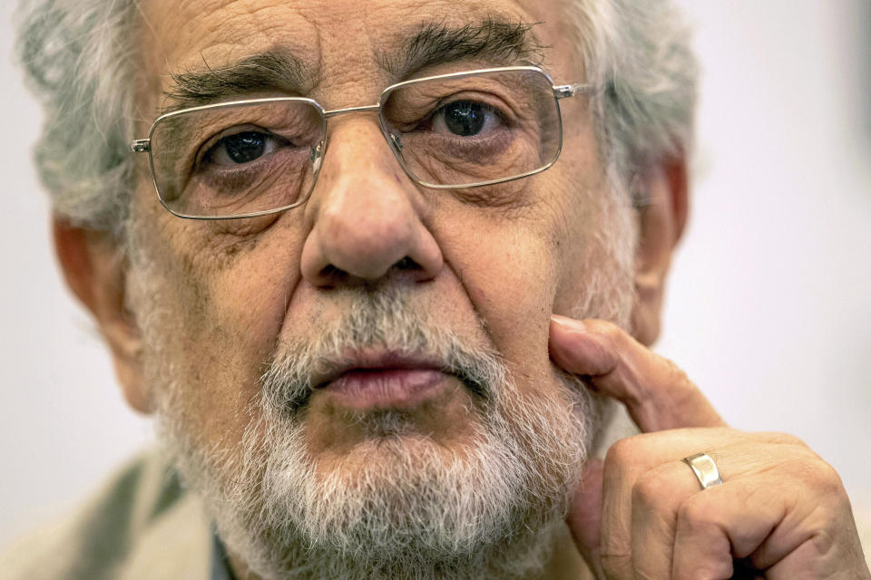 FILE - In this July 12, 2019, file photo, opera singer Placido Domingo speaks during a news conference about his upcoming show "Giovanna d'Arco" in Madrid, Spain. Two opera singers who have accused Domingo of sexual misconduct reacted angrily to his claims in recent interviews that he never behaved improperly and always acted gallantly and like a gentleman with women. Angela Turner Wilson and Patricia Wulf issued a statement Tuesday, Dec. 3, 2019, saying they found Domingo's comments and his "continued failure to take responsibility for wrongdoing" to be disappointing and deeply disturbing. (AP Photo/Bernat Armangue, File)