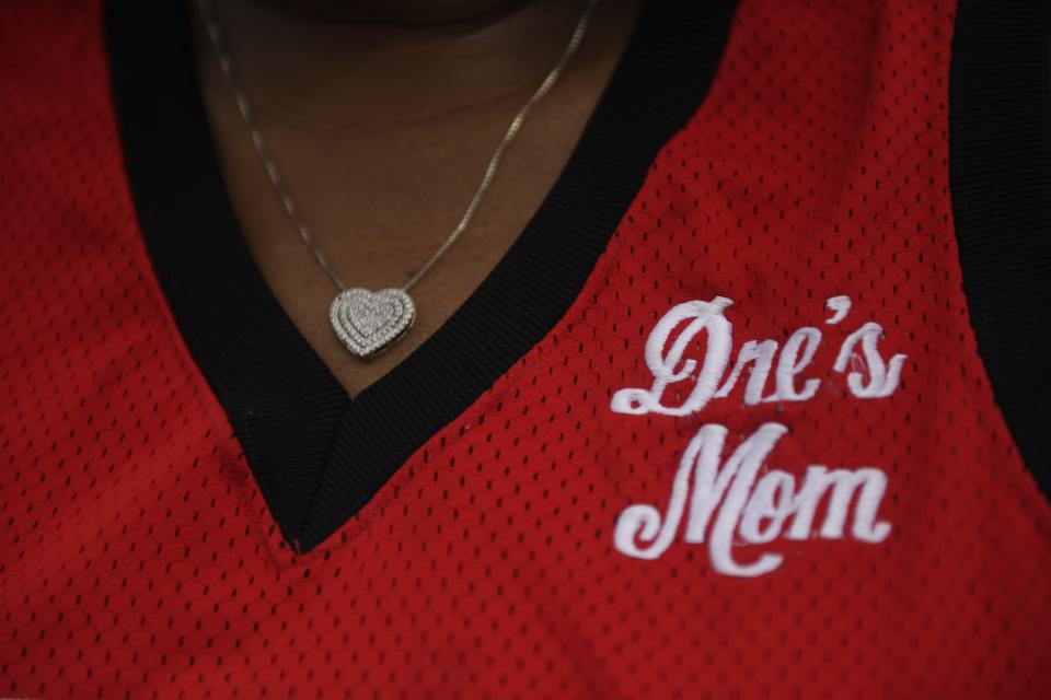 Regina Oliver wears "Dre's Mom" on her son, Andre Emmett's, jersey, Thursday, Sept. 21, 2023, in Dallas.