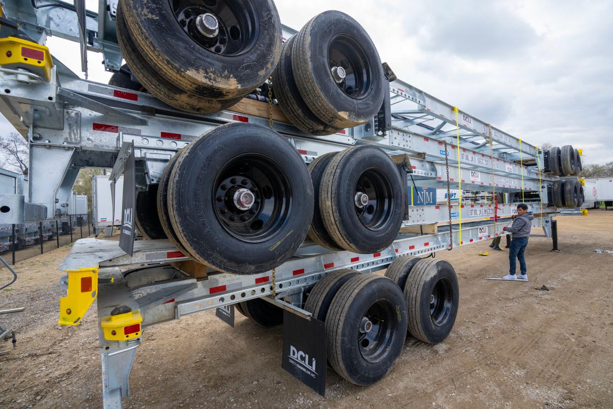 Stacked and completed intermodal container chassis trailers are prepped for pick up Tuesday, April 25, 2023 at Stoughton Trailers in Stoughton, Wis. A Chinese competitor of Stoughton Trailers illegally flooded the United States with products at below-market prices, for less than what Stoughton paid for the raw materials. In 2021, Stoughton and its American peers prevailed in their trade dispute with China when the federal government cleared the way for more than 220% in import duties on Chinese-made trailers.