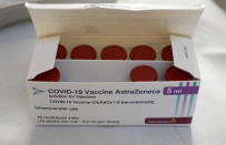 FILE - In this Wednesday, April 14, 2021 file photo, a box with vials of AstraZeneca vaccine against COVID-19 were taken out of a fridge for a few seconds during a vaccination campaign in Amsterdam, Netherlands, . The European Medicines Agency is expected to provide updated guidance Friday April 23, 2021, on how countries across Europe should use the coronavirus vaccine developed by AstraZeneca. (AP Photo/Peter Dejong, File)