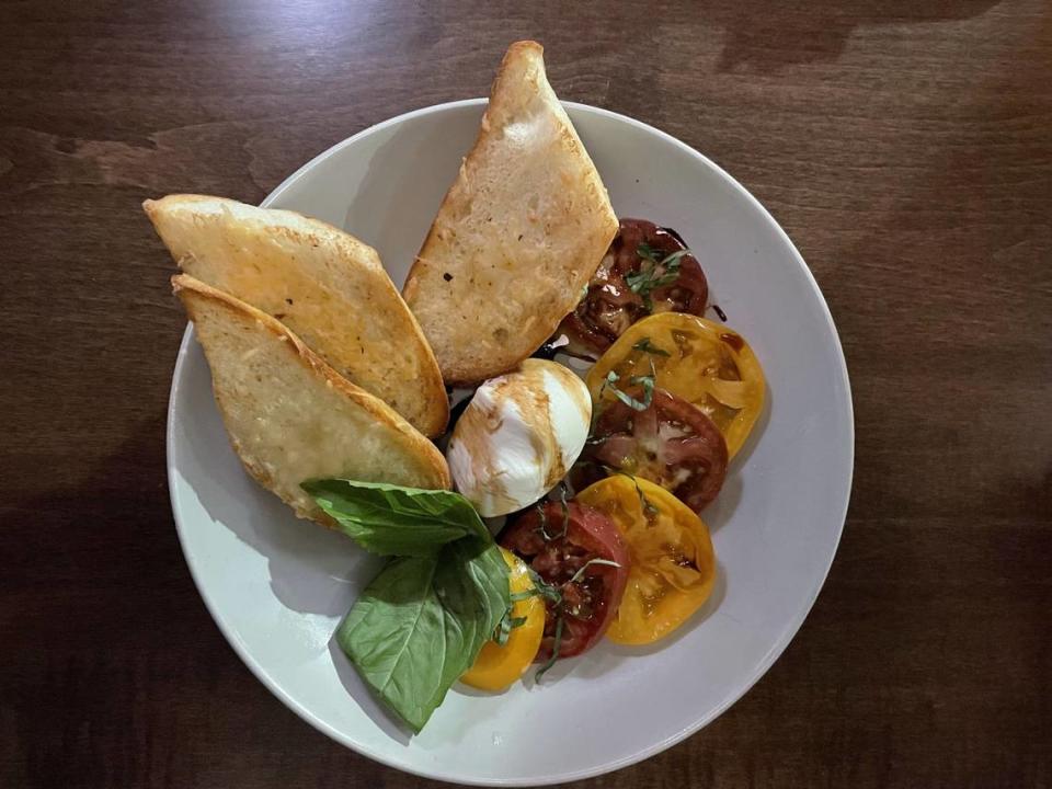 Heirloom Burrata ($15) is a shareable plate at Acero.