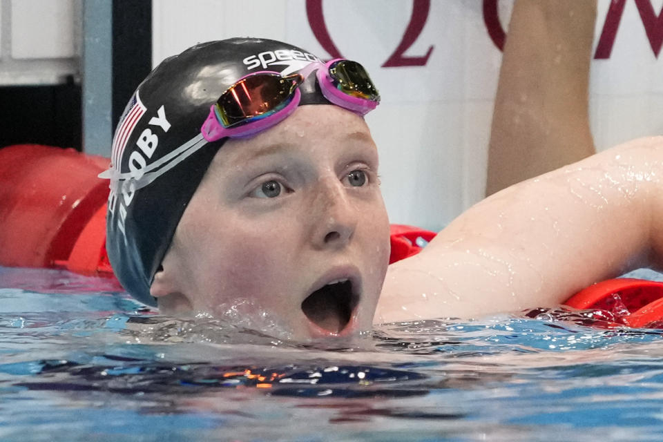 Lydia Jacoby, of the United States, reacts after winning the final of the women's 100-meter breaststroke at the 2020 Summer Olympics, Tuesday, July 27, 2021, in Tokyo, Japan. (AP Photo/Petr David Josek)