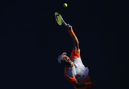 Tennis - Australian Open - Melbourne Park, Melbourne, Australia - 22/1/17 Germany's Mischa Zverev serves during his Men's singles fourth round match against Britain's Andy Murray. REUTERS/Jason Reed