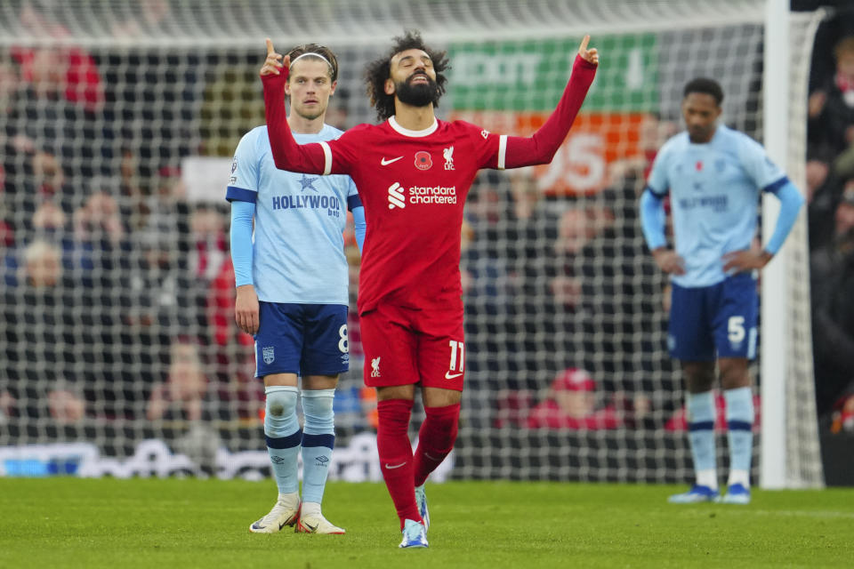 Liverpool's Mohamed Salah celebrates scoring his side's 2nd goal during the English Premier League soccer match between Liverpool and Brentford at Anfield stadium in Liverpool, England, Sunday, Nov. 12, 2023. (AP Photo/Jon Super)