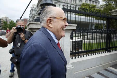 FILE PHOTO: President Donald Trump's attorney Rudy Giuliani arrives at the White House in Washington, U.S., May 30, 2018. REUTERS/Joshua Roberts