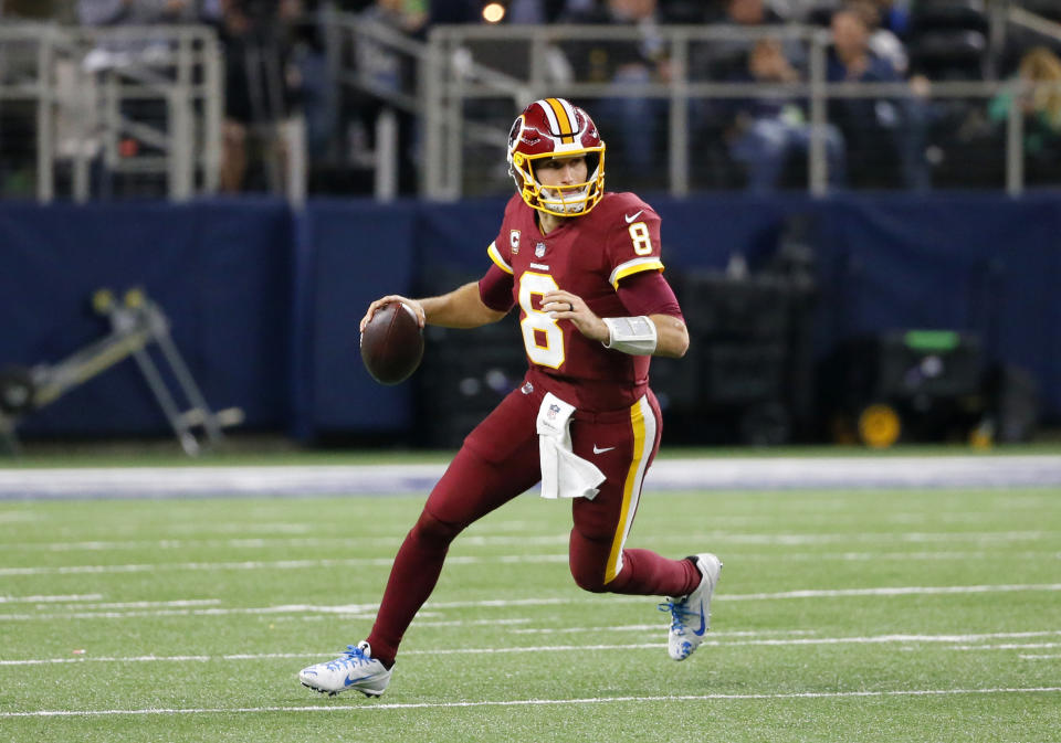 Washington Redskins quarterback Kirk Cousins (8) rolls out of the pocket to pass during an NFL football game against the Dallas Cowboys on Thursday, Nov. 30, 2017, in Arlington, Texas. (AP)