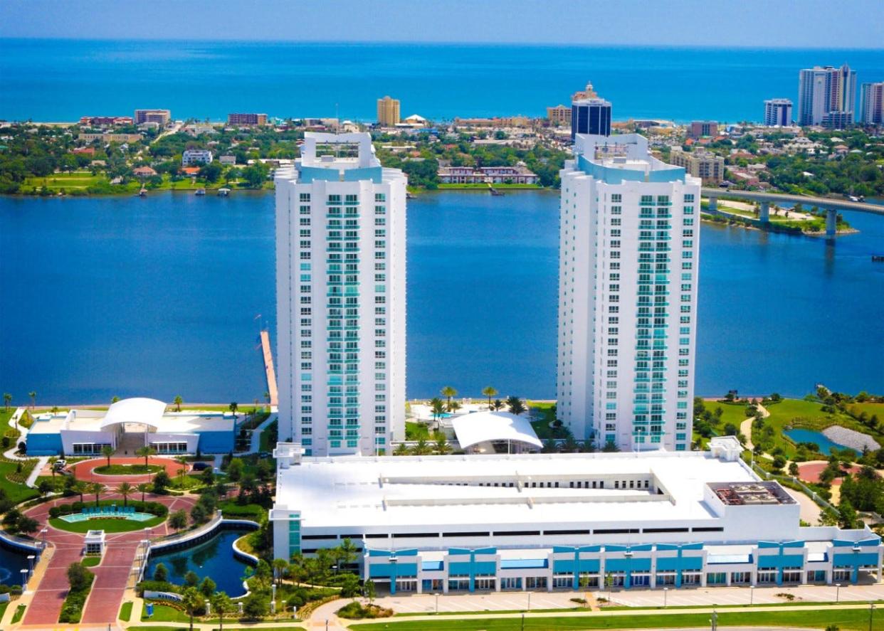 Surrounded by spectacular views of the Atlantic Ocean and the Intracoastal Waterway, the exclusive riverfront community of Marina Grande in Holly Hill offers an array of amenities, including several outdoor lounges and a private cinema.