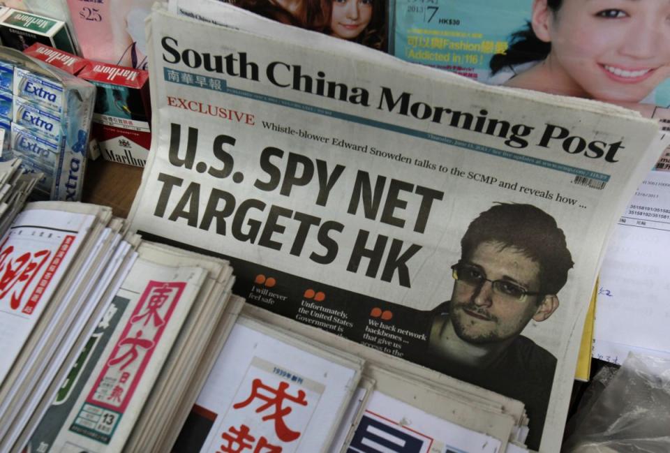 A copy of the South China Morning Post, carrying an interview with Edward Snowden, is displayed on a newspaper stand in Hong Kong on June 13, 2013. (Photo: Bobby Yip/Reuters)