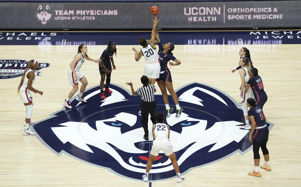 Connecticut and St. John's tip off to start an NCAA college basketball game Wednesday, Feb. 3, 2021, in Storrs, Conn. (David Butler II/Pool Photo via AP)