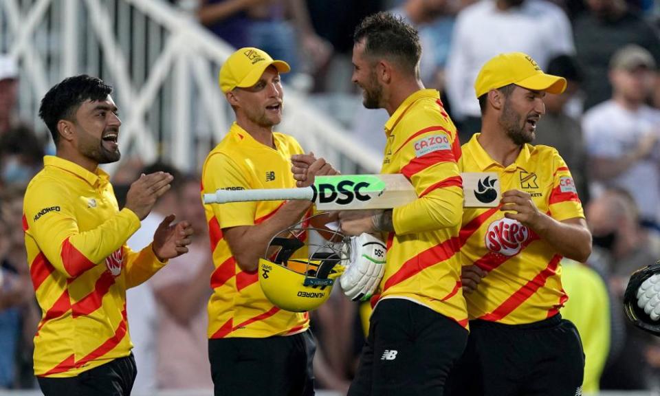 Trent Rockets’ Alex Hales (second right) shakes hands with Joe Root as the team celebrate the win after the Hundred match at Trent Bridge last week.