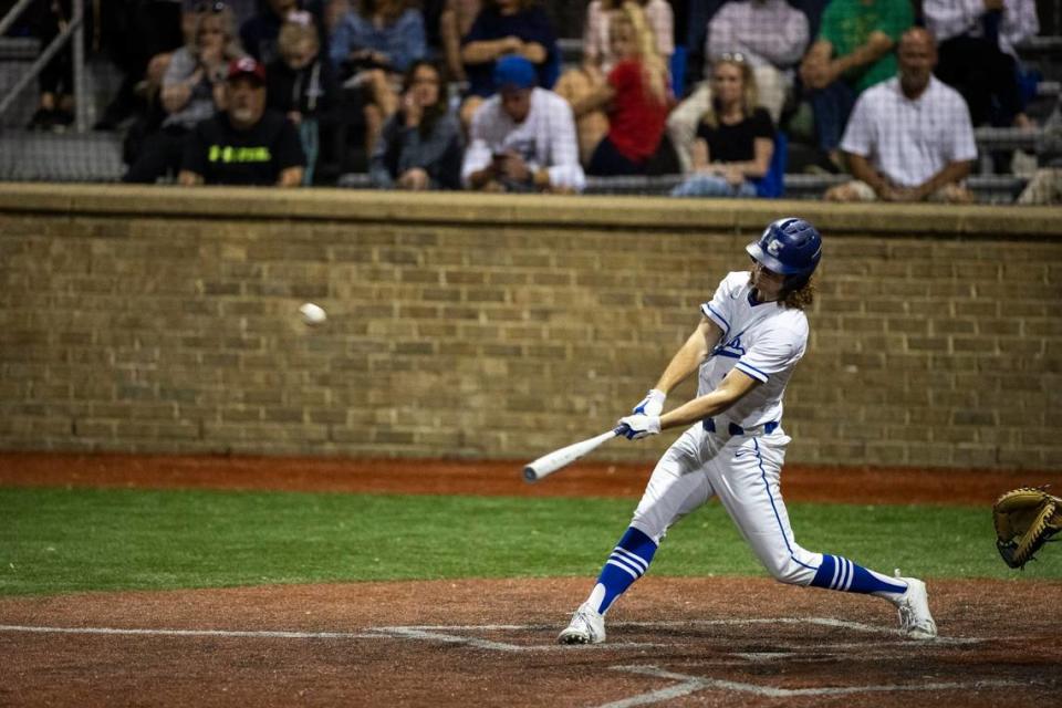 Lexington Catholic’s Colt Thomas (7) launches a home run against Tates Creek. Thomas has committed to play college baseball at Centre.