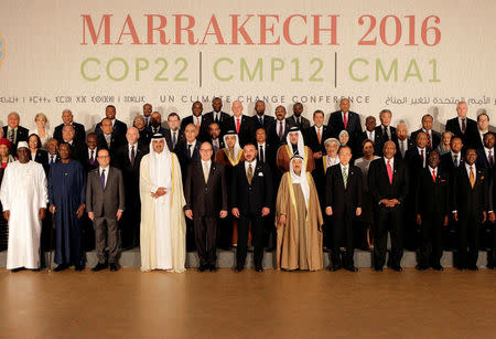 World leaders pose for a family photo at the UN Climate Change Conference 2016 (COP22) in Marrakech, Morocco November 15, 2016. REUTERS/Youssef Boudlal