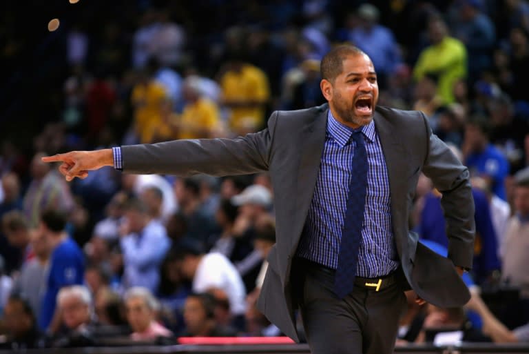 Head coach J.B. Bickerstaff of the Houston Rockets reacts during their game against the Golden State Warriors on February 9, 2016