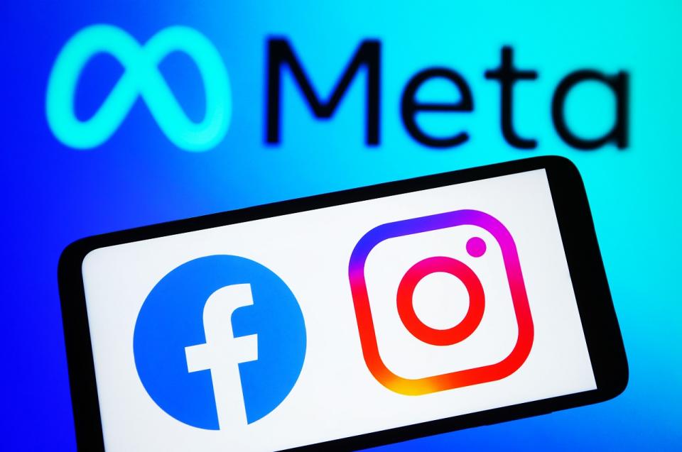 meta logo with facebook and instagram logos on smartphone