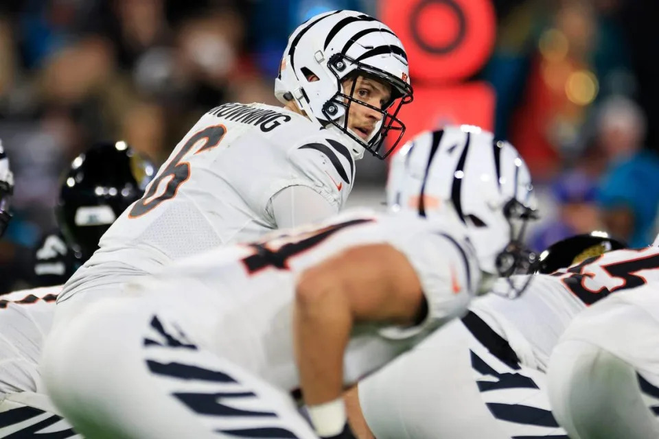 Cincinnati Bengals quarterback Jake Browning (6) calls a play during the third quarter of a regular season NFL football matchup Monday, Dec. 4, 2023 at EverBank Stadium in Jacksonville, Fla. The Cincinnati Bengals defeated the Jacksonville Jaguars 34-31 in overtime.