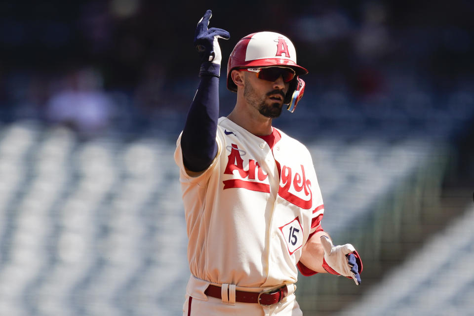 Los Angeles Angels' Randal Grichuk celebrates after hitting a double during the first inning of a baseball game against the Cleveland Guardians, Sunday, Sept. 10, 2023, in Anaheim, Calif. (AP Photo/Ryan Sun)