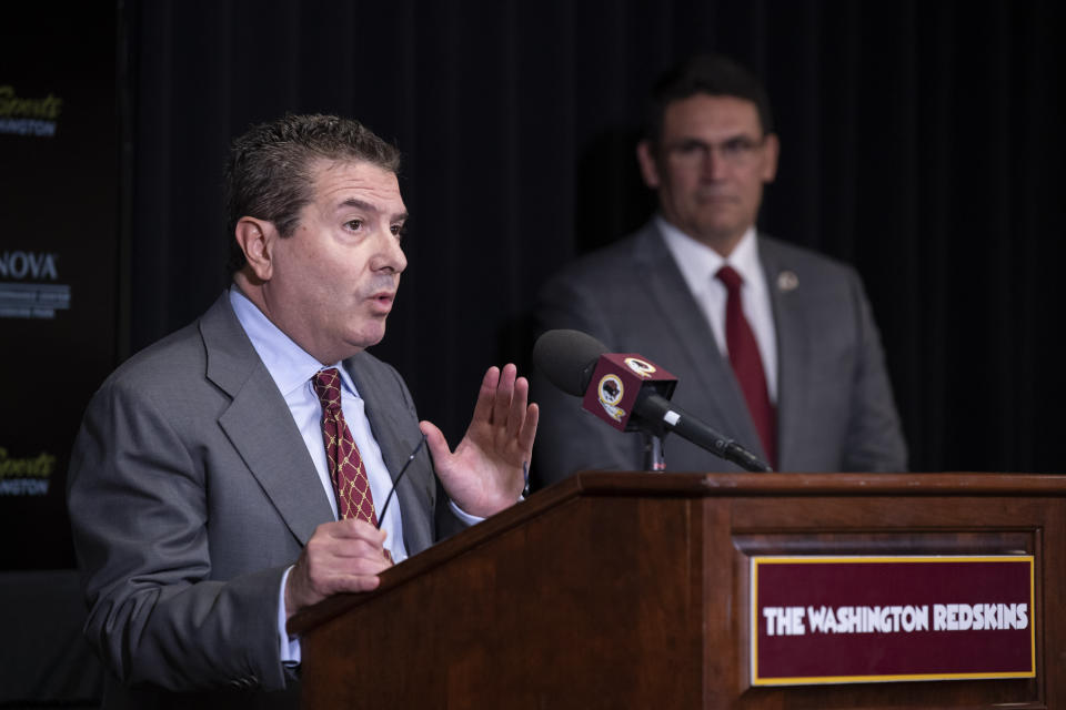 Washington Redskins owner Dan Snyder, left, speaks, accompanied by new head coach Ron Rivera, during a media conference at the team's training facility on Thursday, Jan. 2, 2020, in Ashburn, Va.