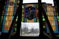 A stained glass portrait of Bishop W.F. Ball, which hearkens back to the historic roots of Clayborn Temple, hangs in Memphis, Tennessee, U.S. March 25, 2018. The church is the building where the striking workers met 50 years ago at the time of Martin Luther King Jr. assassination. REUTERS/Jonathan Ernst