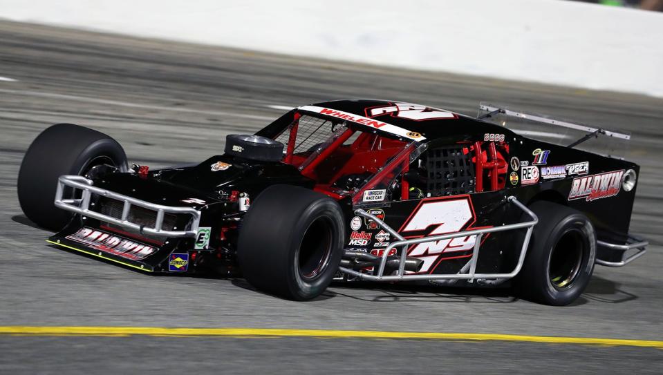 Doug Coby, driver of the #7 John Blewett Inc. Modified races during the CheckeredFlag.com 150 for the NASCAR Whelen Modified Tour at Larry King Law\