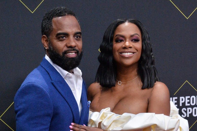 Kandi Burruss (R) and Todd Tucker attend the E! People's Choice Awards in 2019. File Photo by Jim Ruymen/UPI