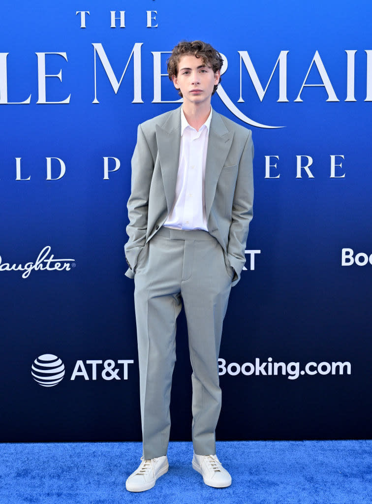 Jacob Tremblay at "The Little Mermaid" premiere wearing a casual suit and sneakers