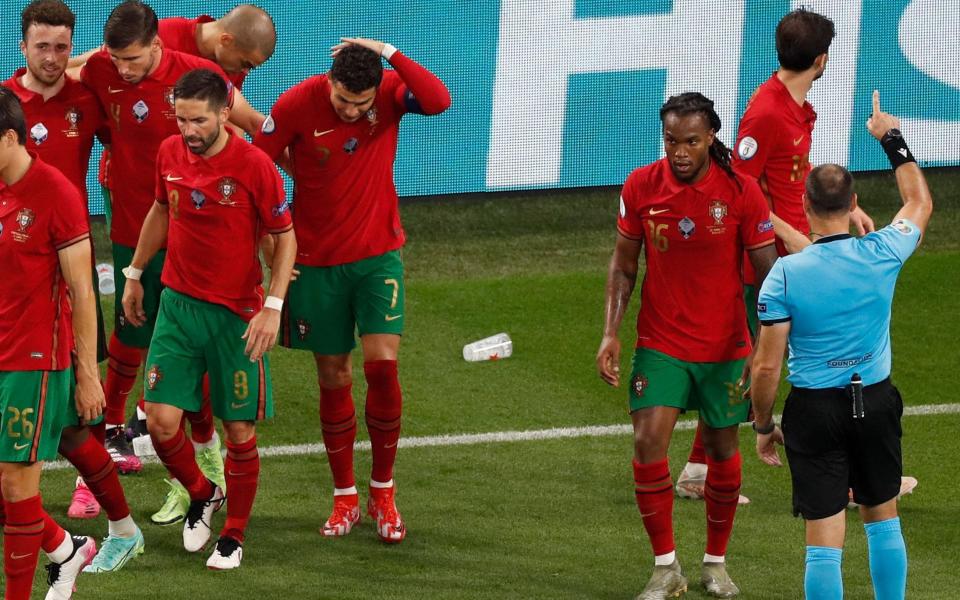 Coca-Cola bottle thrown at Cristiano Ronaldo days after press conference snub - AFP