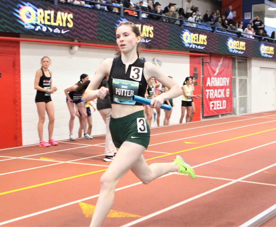 Cornwall's Maris Potter runs a leg on the Dragons' 4x800 relay during the March 12, 2023 Nike Indoor Nationals at The Armory. Cornwall won bronze.
