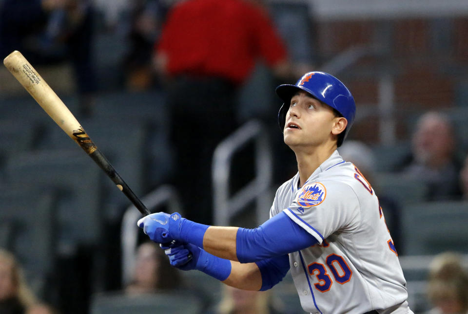 New York Mets outfielder Michael Conforto is a line drive hitter who seems to have fallen in the homer trap. (AP Photo/John Bazemore)